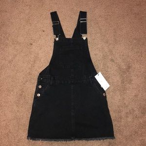 black overall dress